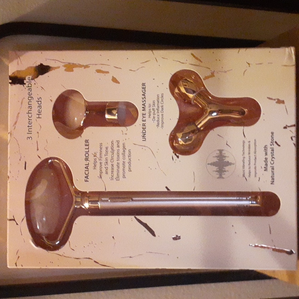 sonic quartz massager that micro vibrates tired skin. Brand New.